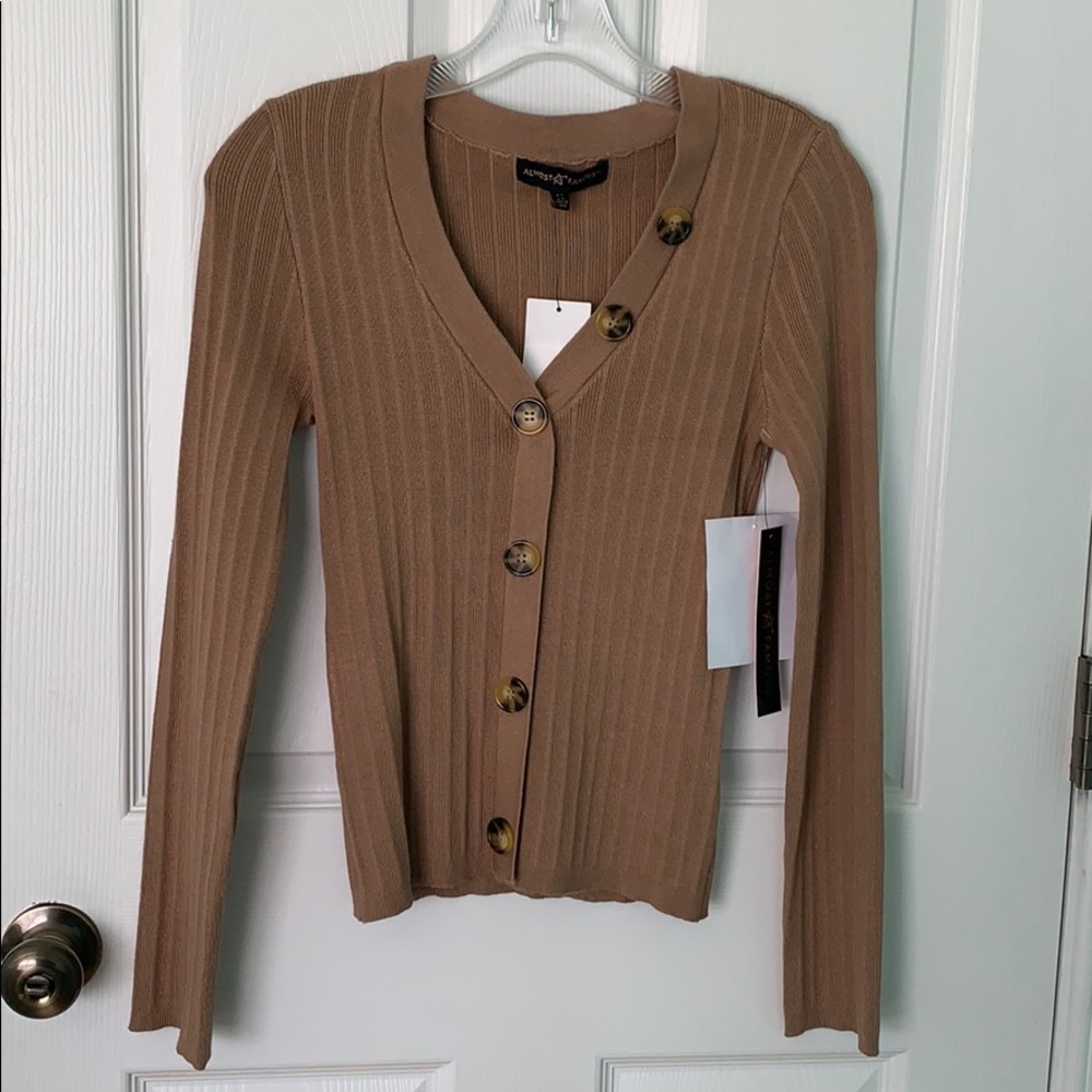 thin long sleeve with buttons WITH TAGS NEVER WORN
